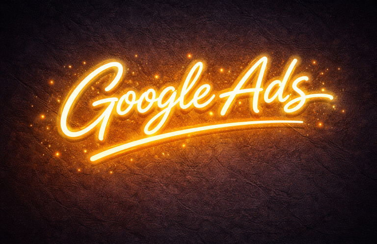 Leuchtender Schriftzug "Google Ads" auf dunklem Hintergrund.
