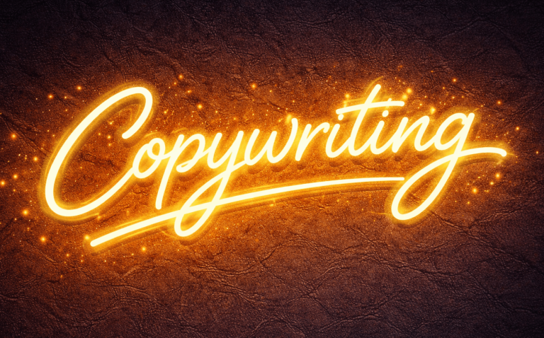 isi-Netzwerkagentur Leuchtender Schriftzug "Copywriting" in orange auf dunklem Hintergrund.