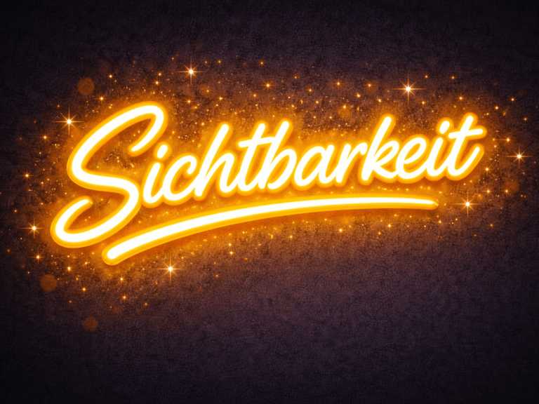 Der Schriftzug "Sichtbarkeit" in leuchtendem Orange auf dunklem Hintergrund.